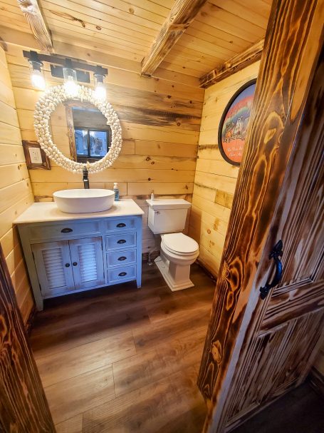 Rustic bathroom inside Airbnb Cabin made by Amish