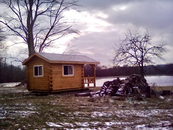 Single room log cabin built on the lake.
